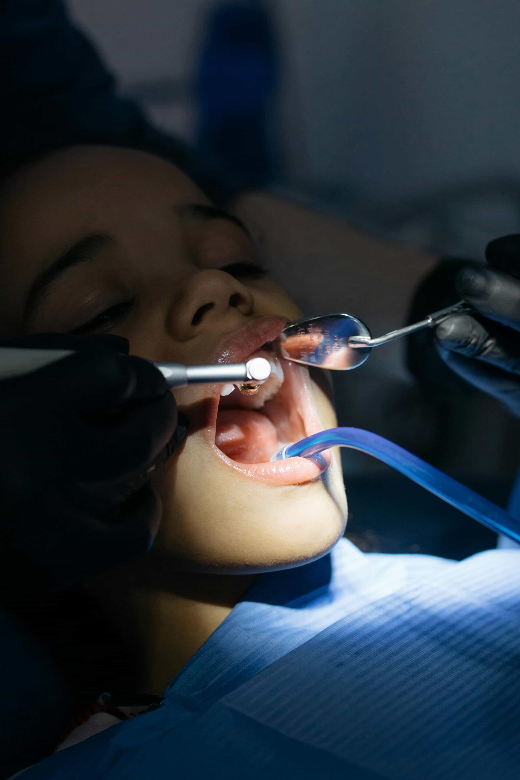 orthodontist working on patient